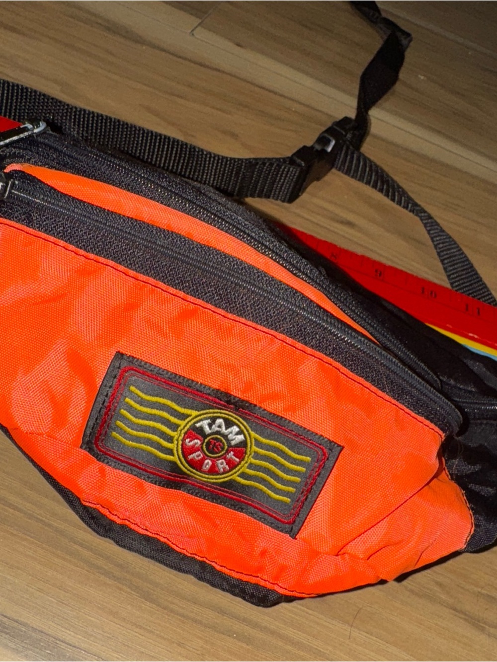 Tam Sport waist pack with classic embroidered logo patch and durable nylon